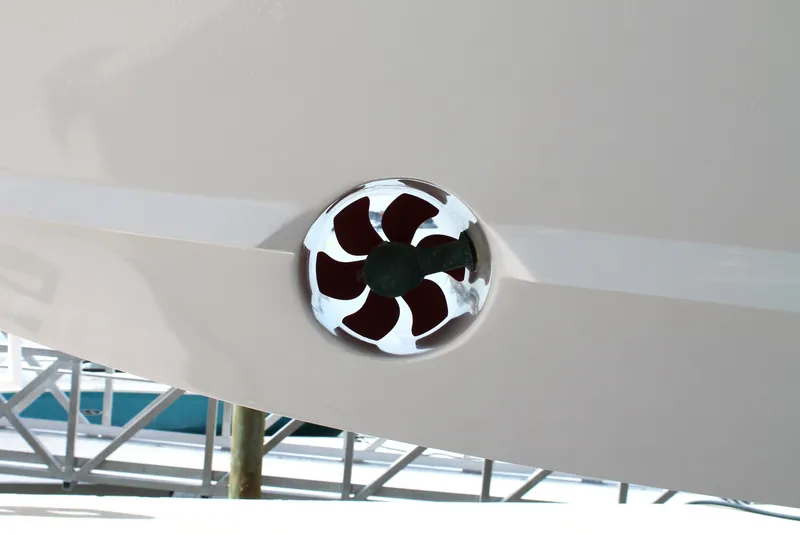 Slide: The Image of 2024 Intrepid 41 Valor boat hull with a bow thruster detail. - 39