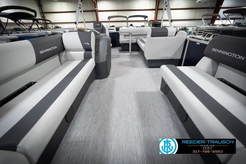 Slide: The Image of Interior of 2026 Bennington 20 SL pontoon boat with gray seating and modern design. - 16