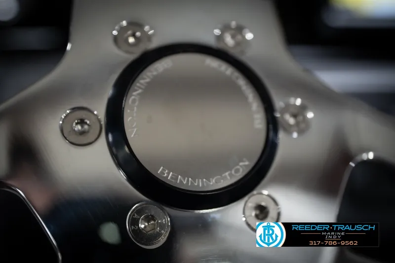 Slide: The Image of Close-up of 2026 Bennington 20 SL steering wheel with Reeder Trausch Marine logo. - 33