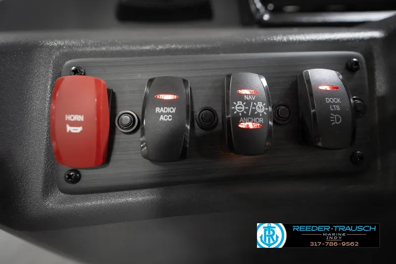 Slide: The Image of Control panel of a 2026 Bennington 20 SL boat with labeled switches. - 34