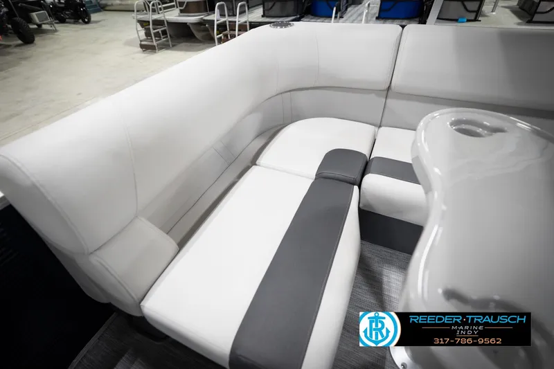 Slide: The Image of 2026 Bennington 20 SL boat interior with white and gray seating, showcased at Reeder Trausch Marine. - 42