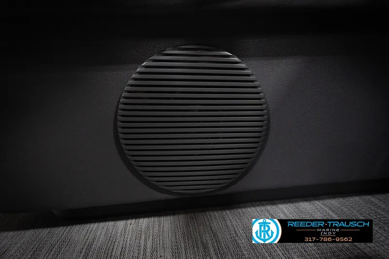 Slide: The Image of Speaker detail on 2026 Bennington 20 SL boat interior, Reeder-Trausch Marine logo visible. - 45