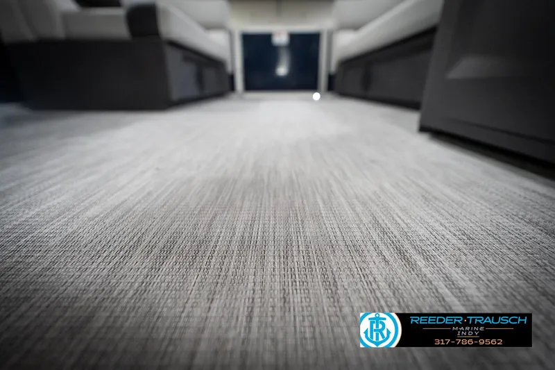 Slide: The Image of Interior view of 2026 Bennington 20 SL boat with textured flooring. - 47