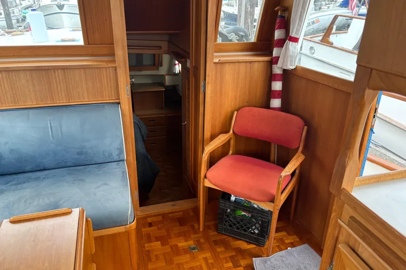Slide: The Image of Interior of 1991 Grand Banks 36 Classic boat with wooden furnishings and seating. - 14