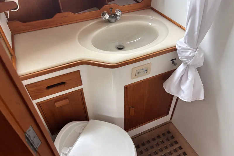 Slide: The Image of Bathroom interior of 1991 Grand Banks 36 Classic yacht with sink and toilet. - 17