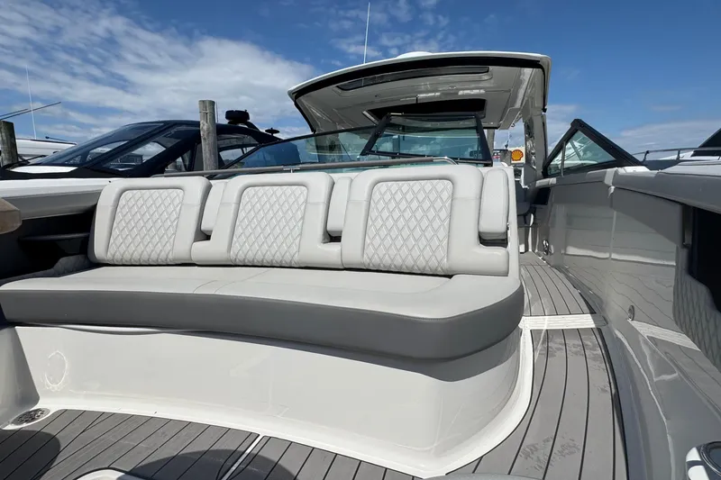 Slide: The Image of 2023 Sea Ray SLX 400 Outboard boat with luxurious seating and sleek design. - 40