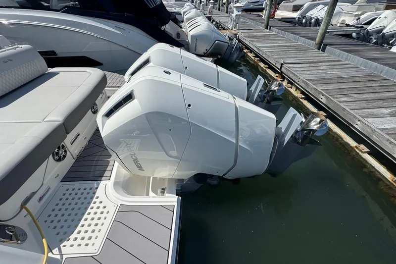 Slide: The Image of 2023 Sea Ray SLX 400 Outboard with powerful engines docked at marina. - 7