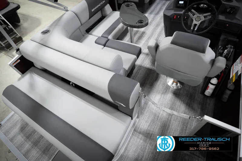 Slide: The Image of 2026 Bennington 168 SLJ boat interior with gray seating and steering console. - 14