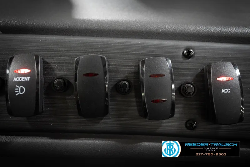 Slide: The Image of Dashboard switches of 2026 Bennington 168 SLJ boat with accent lighting. - 36