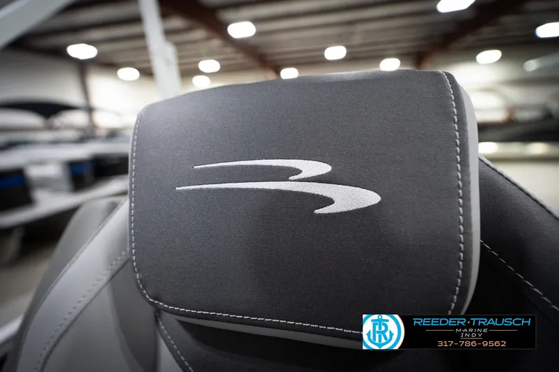 Slide: The Image of 2026 Bennington 168 SLJ boat seat with logo in showroom setting. - 39