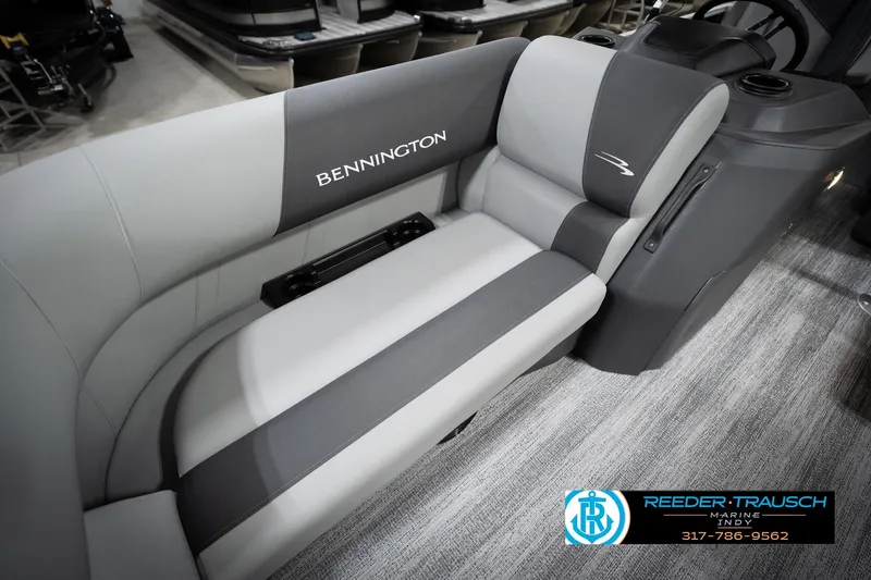 Slide: The Image of 2026 Bennington 168 SLJ boat interior with gray seating and modern design. - 42