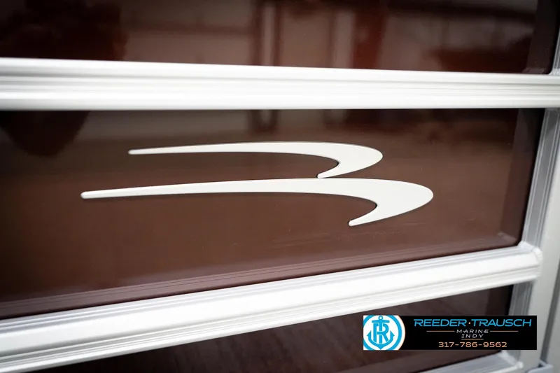 Slide: The Image of 2026 Bennington 168 SLJ boat logo with Reeder-Trausch Marine contact details. - 46