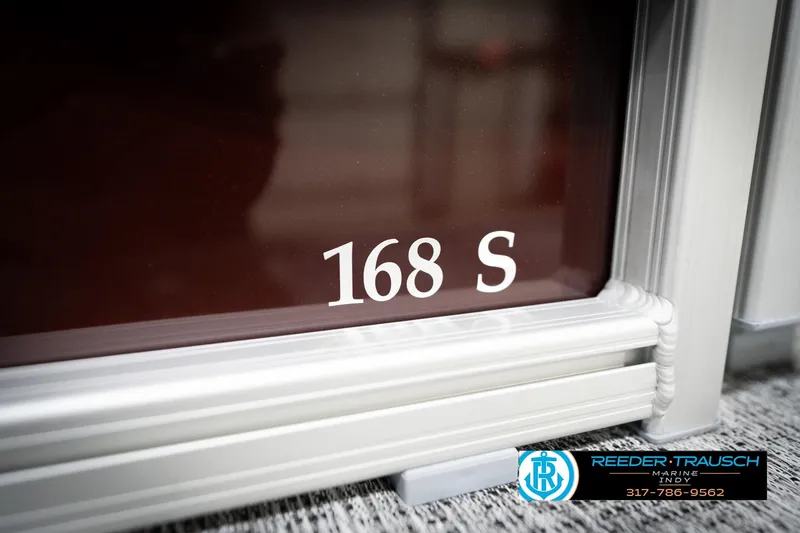 Slide: The Image of 2026 Bennington 168 SLJ boat detail with Reeder-Trausch Marine logo. - 49