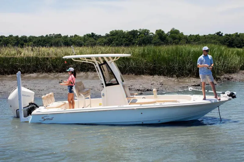 The Image of Manufacturer Provided Image: 2025 Scout 231 XSB boat with two people fishing in a scenic waterway. - 0