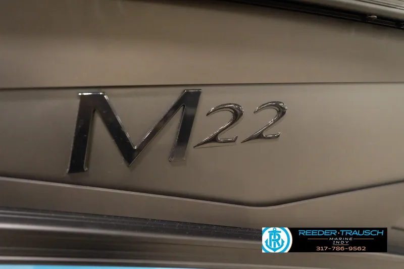 Slide: The Image of 2026 Bennington 22 MFB boat model emblem with dealership logo. - 103
