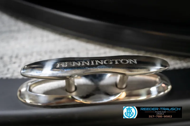 Slide: The Image of Close-up of a Bennington 22 MFB 2026 boat cleat with engraved branding. - 106
