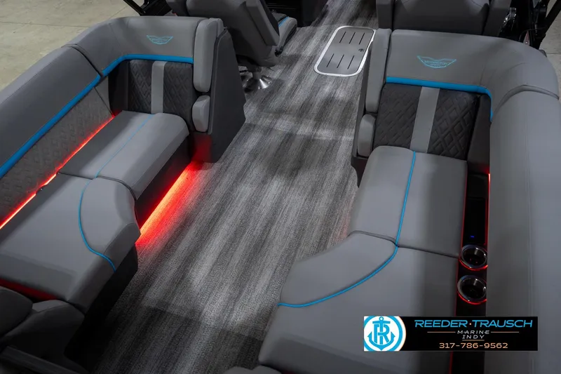 Slide: The Image of Luxurious interior of 2026 Bennington 22 MFB pontoon boat with LED lighting and cup holders. - 14