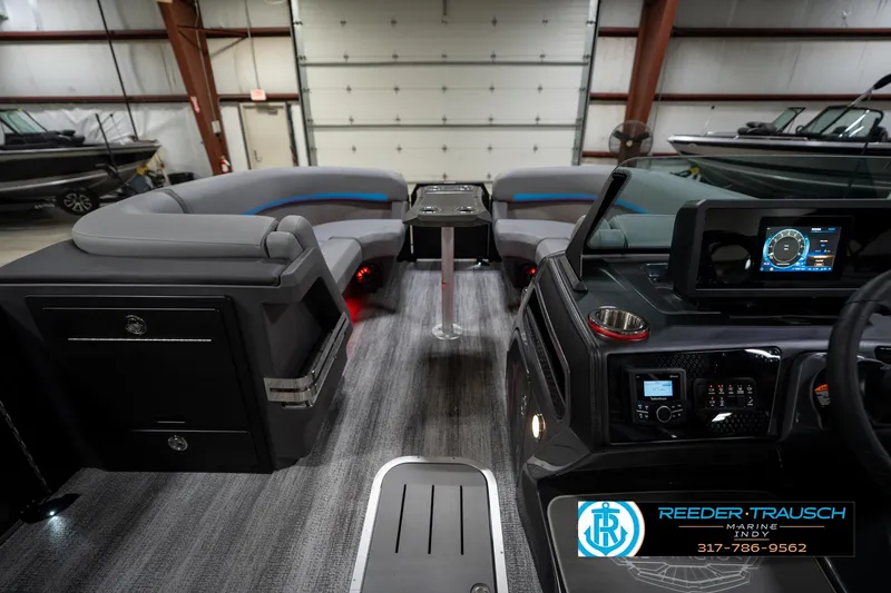 Slide: The Image of Luxurious interior of 2026 Bennington 22 MFB pontoon boat with stylish seating. - 20