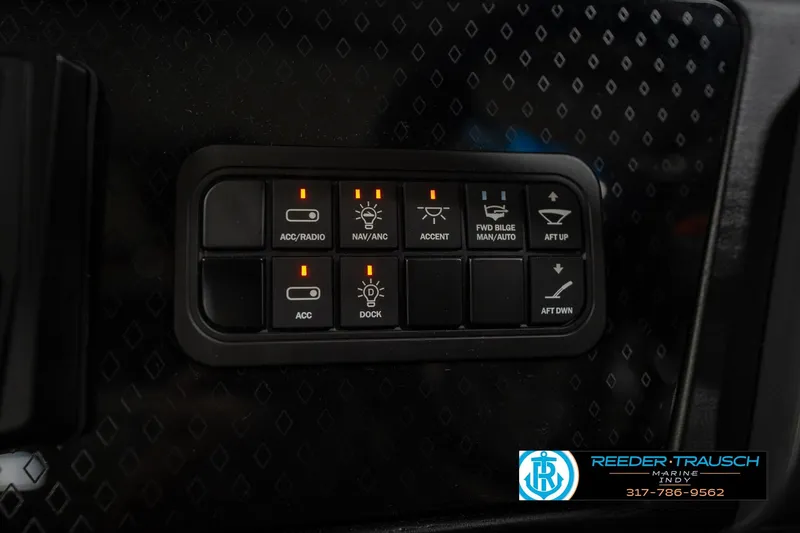 Slide: The Image of 2026 Bennington 22 MFB boat interior with fold-out table and seating. - 35
