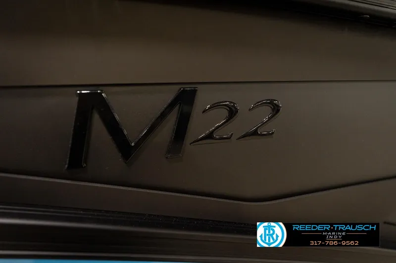 Slide: The Image of Red-lit speaker on 2026 Bennington 22 MFB boat, showcased by Reeder-Trausch Marine. - 50