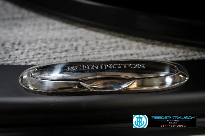 Slide: The Image of Illuminated cup holders on 2026 Bennington 22 MFB boat, featuring sleek design and red lighting. - 52