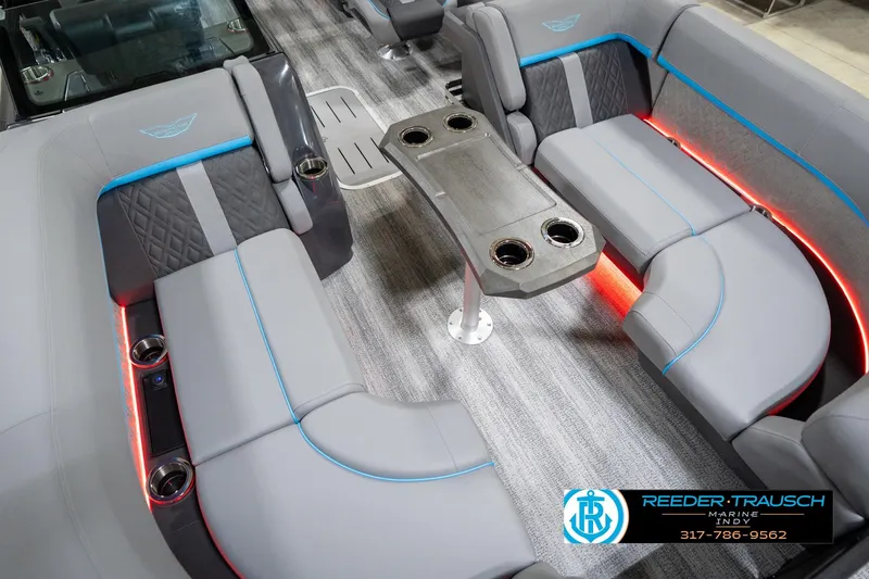 Slide: The Image of Luxurious interior of 2026 Bennington 22 MFB pontoon boat with LED lighting and cup holders. - 66