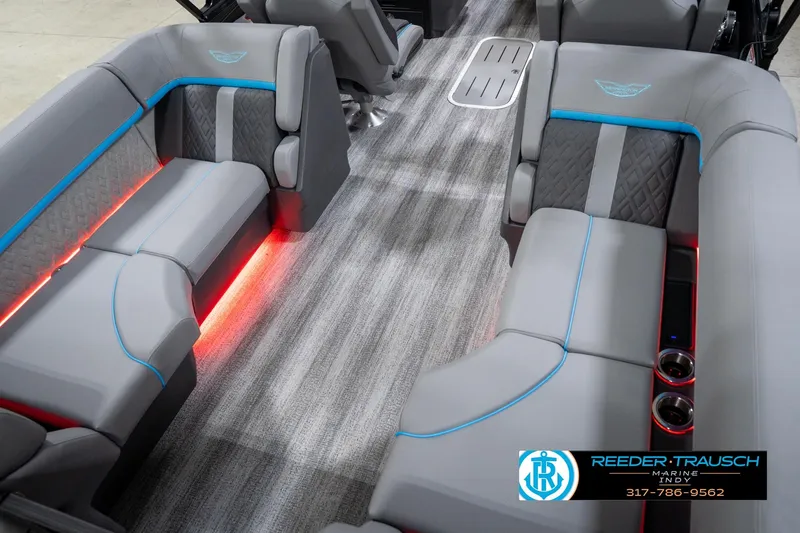 Slide: The Image of Interior of 2026 Bennington 22 MFB pontoon boat with gray seating and ambient lighting. - 67