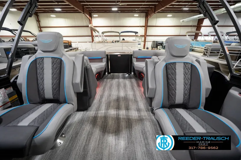 Slide: The Image of Luxurious interior of 2026 Bennington 22 MFB pontoon boat with stylish seating. - 70