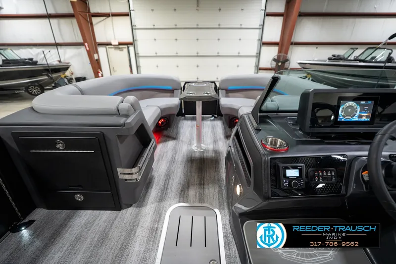 Slide: The Image of Interior of 2026 Bennington 22 MFB boat with modern dashboard and seating. - 73