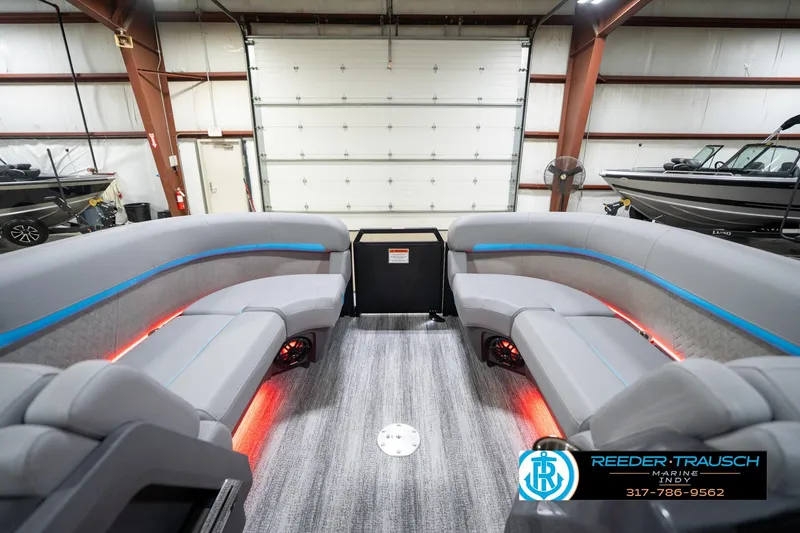 Slide: The Image of 2026 Bennington 22 MFB boat interior with modern seating and ambient lighting. - 75