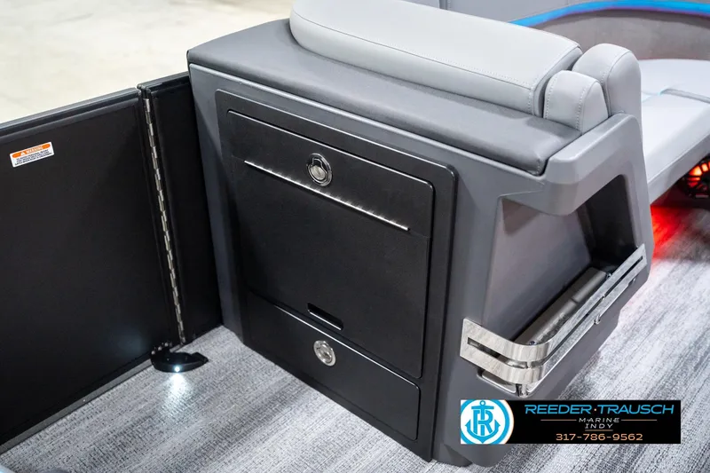 Slide: The Image of 2026 Bennington 22 MFB boat interior with storage compartment and seating. - 81