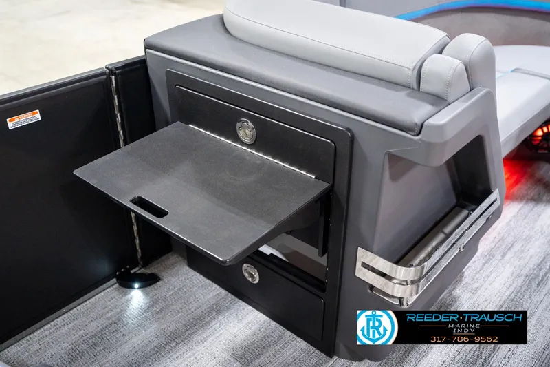 Slide: The Image of 2026 Bennington 22 MFB boat interior with fold-out table and seating. - 82