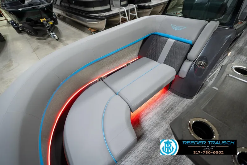 Slide: The Image of Luxurious seating on 2026 Bennington 22 MFB pontoon boat with ambient lighting. - 94