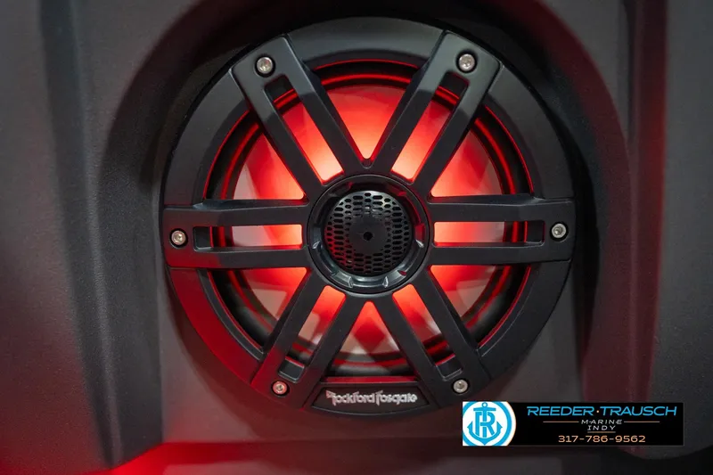 Slide: The Image of Close-up of a Rockford Fosgate speaker with red lighting on a 2026 Bennington 22 MFB. - 96