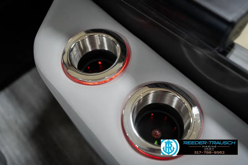 Slide: The Image of Illuminated cup holders on 2026 Bennington 22 MFB boat, featuring sleek design and red lighting. - 99
