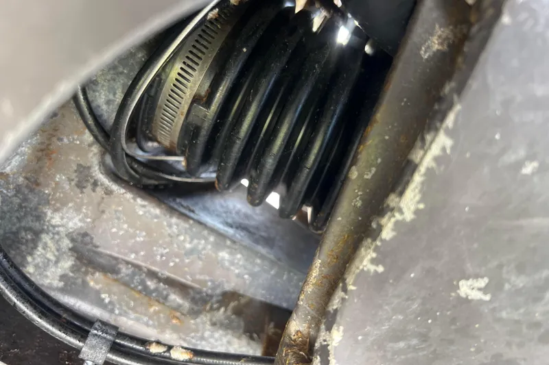 Slide: The Image of Close-up of a 2007 Azure AZ240 vehicle component with visible hose and clamp. - 20