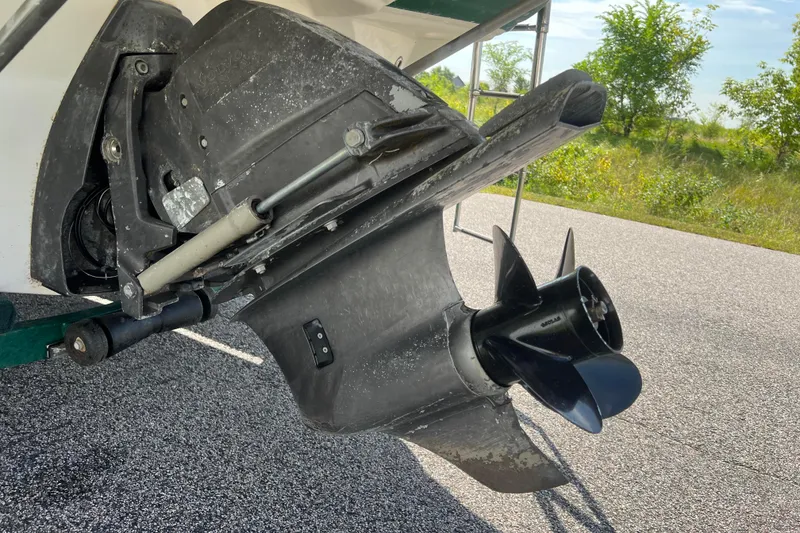Slide: The Image of Close-up of a 2007 Azure AZ240 boat propeller and outdrive on a sunny day. - 21