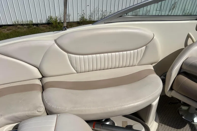 Slide: The Image of 2007 Azure AZ240 boat interior with beige leather seating and sleek design. - 26
