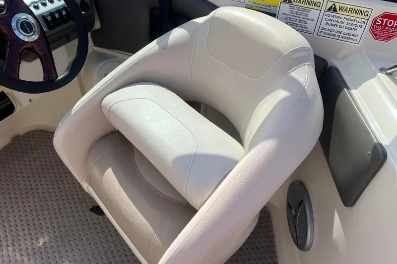 Slide: The Image of Boat interior with white leather seat and steering wheel, Azure AZ240, 2007 model. - 33