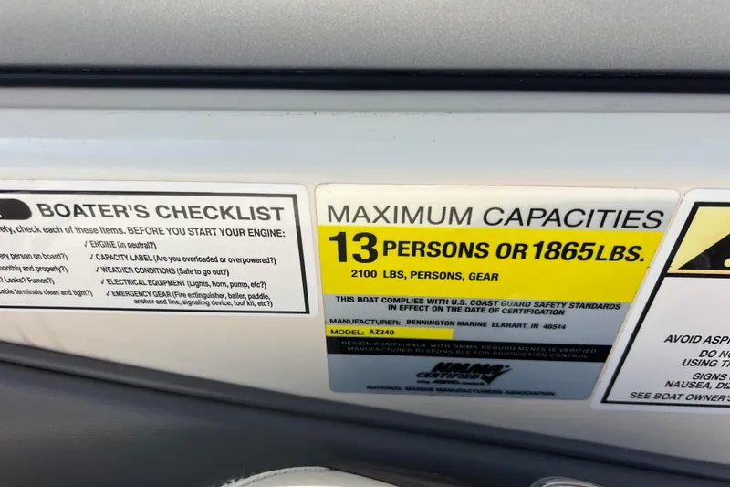 Slide: The Image of Boat capacity label for Azure AZ240, 2007 model, max 13 persons or 1865 lbs. - 38