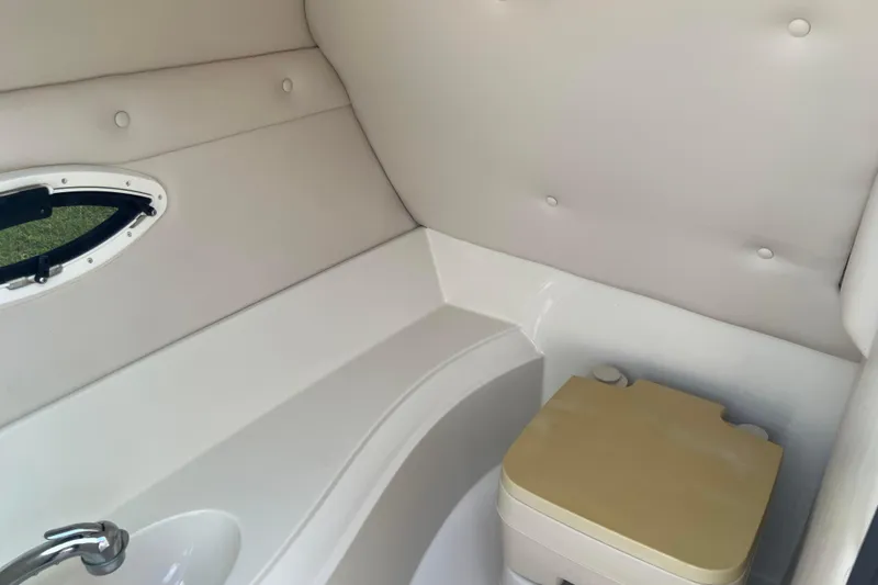 Slide: The Image of Compact boat bathroom interior with sink and portable toilet, Azure AZ240, 2007 model. - 46