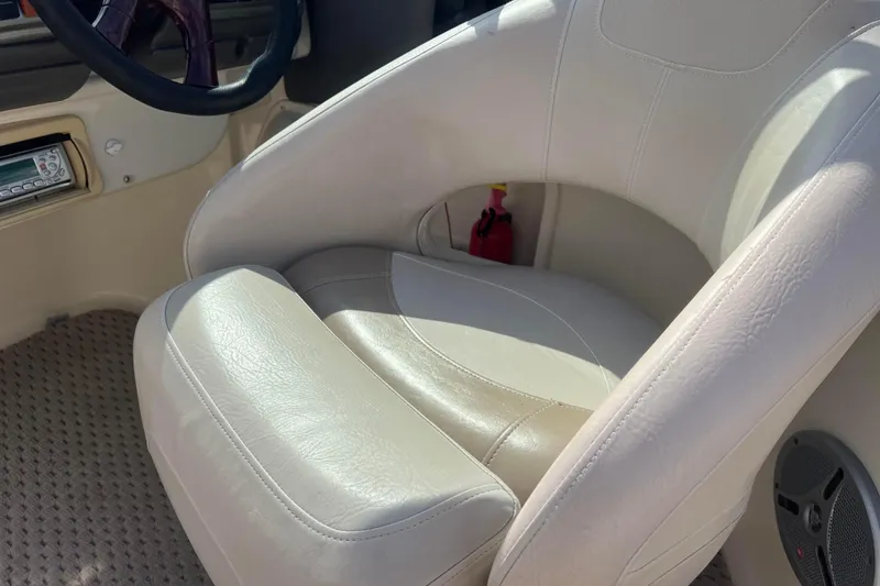 Slide: The Image of Luxurious white leather seat in 2007 Azure AZ240 boat interior. - 56