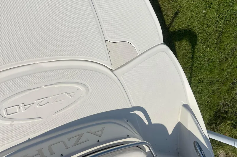Slide: The Image of 2007 Azure AZ240 boat deck with embossed logo, viewed from above. - 59