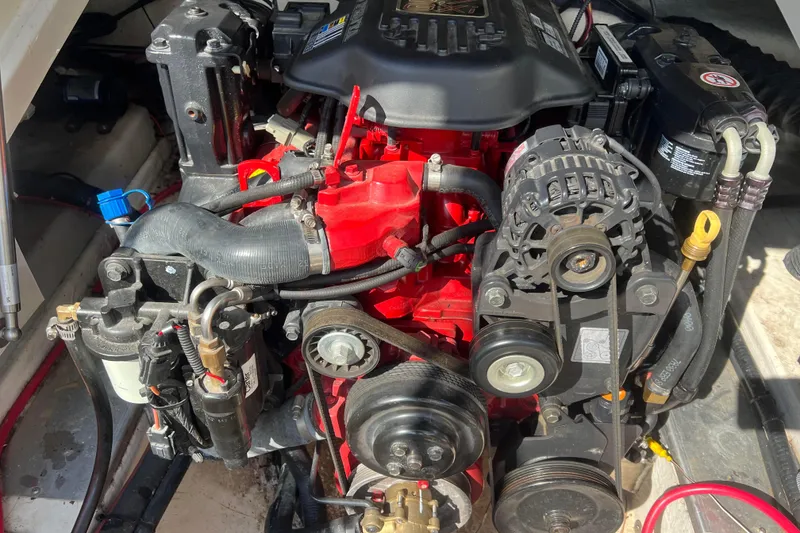 Slide: The Image of 2007 Azure AZ240 engine compartment with visible components and wiring. - 9