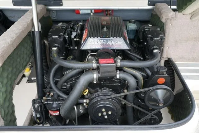 Slide: The Image of Engine of a 1995 Sea Ray 200 Select boat, showcasing detailed components and layout. - 17