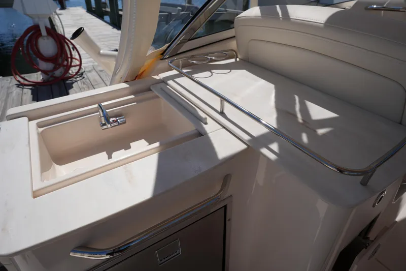 Slide: The Image of 2023 Grady-White Freedom 285 boat sink and countertop detail. - 28