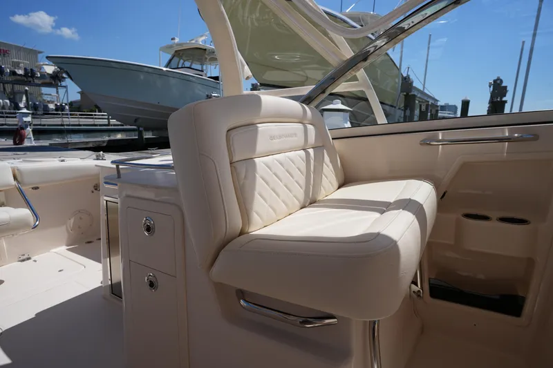 Slide: The Image of 2023 Grady-White Freedom 285 boat interior with luxurious seating and sleek design. - 32