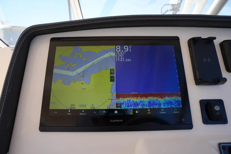 Slide: The Image of Garmin navigation display on 2023 Grady-White Freedom 285 boat dashboard. - 36