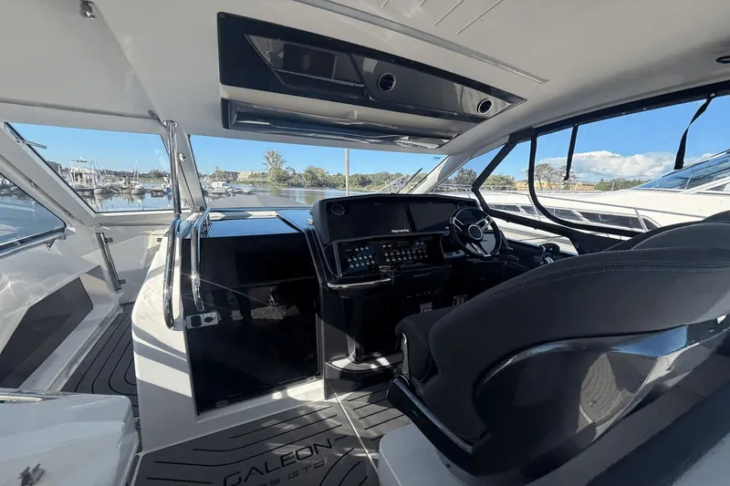 Slide: The Image of Interior of 2024 Galeon 325 GTO with modern control console. - 20