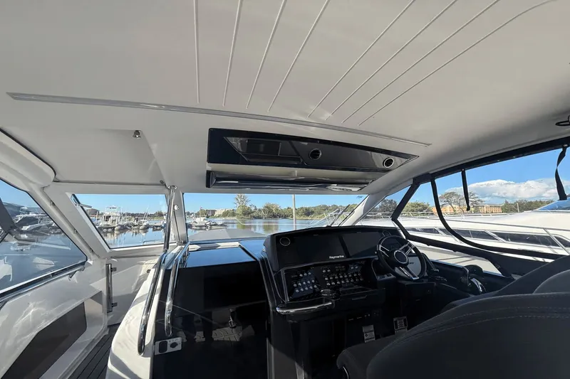 Slide: The Image of 2024 Galeon 325 GTO cockpit with modern instrumentation. - 21